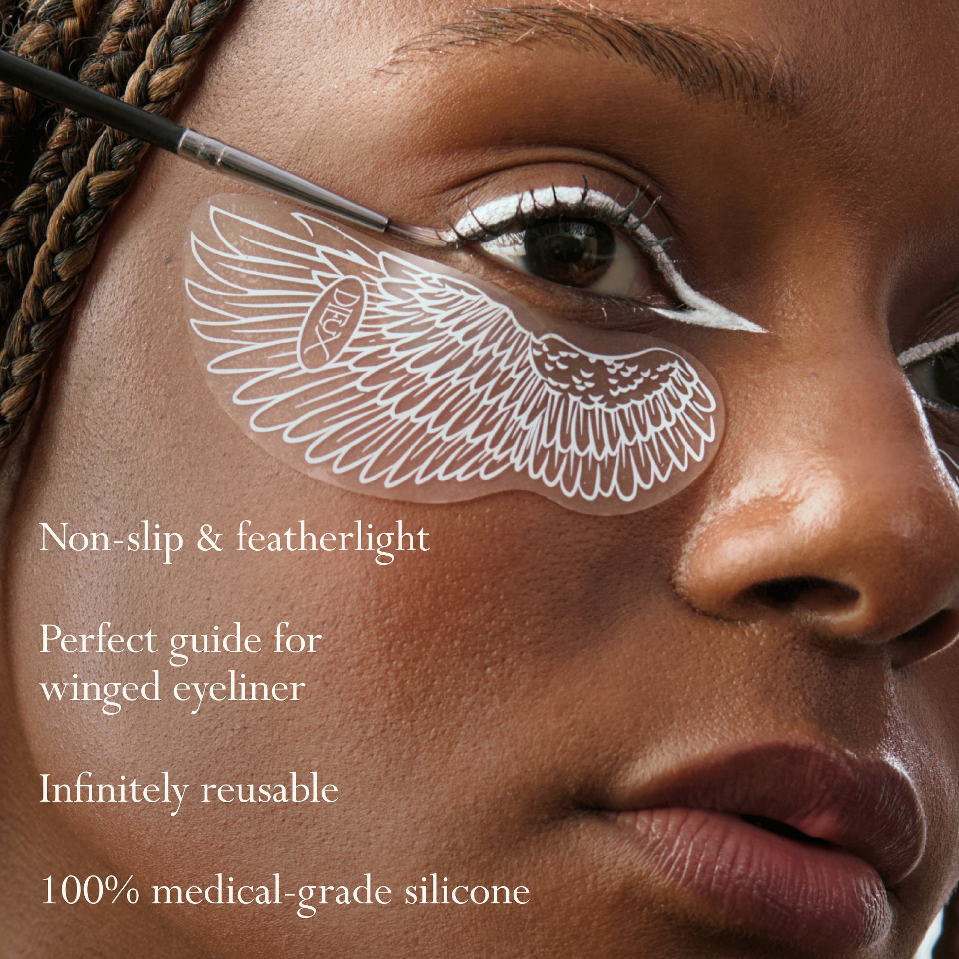 Model using Dieux Winged Forever Eye Mask as a guide for eyeliner